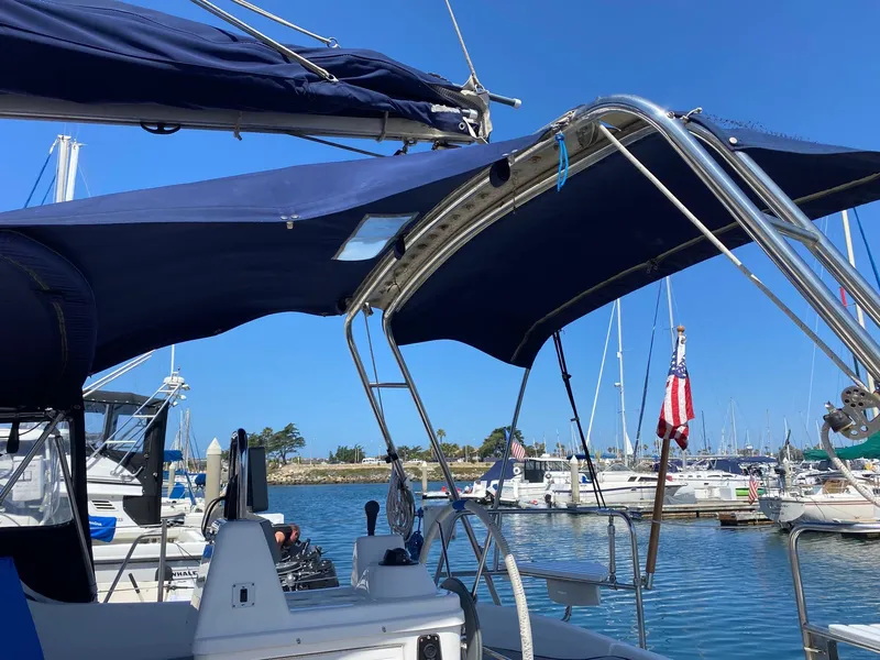 Traveler arch and bimini top