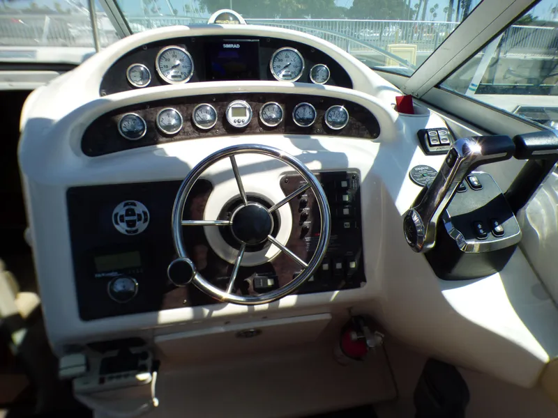 2001 Monterey 302 Cruiser dashboard with steering wheel and control panel.