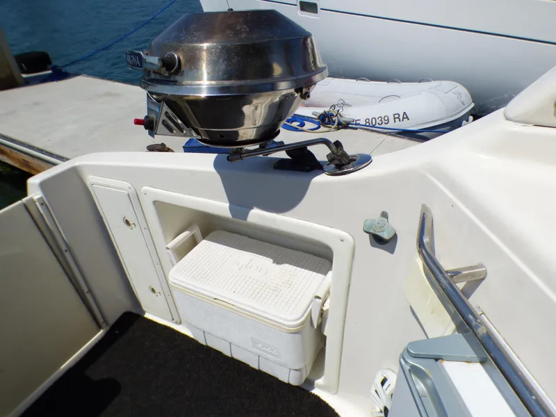 2001 Monterey 302 Cruiser deck with grill and storage compartment.