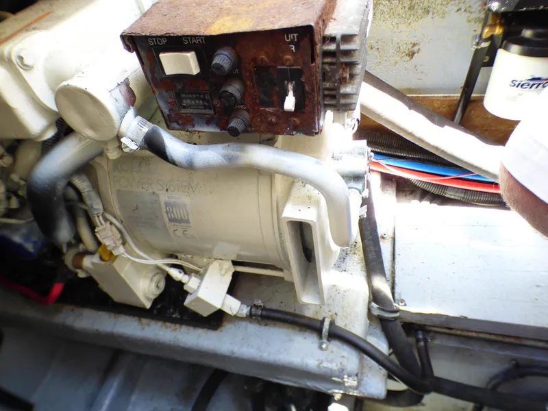 Engine compartment of a 2001 Monterey 302 Cruiser with visible wiring and components.