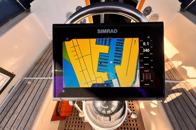 Simrad navigation display on 1979 O'Day 37 Center Cockpit sailboat, showing nautical chart.