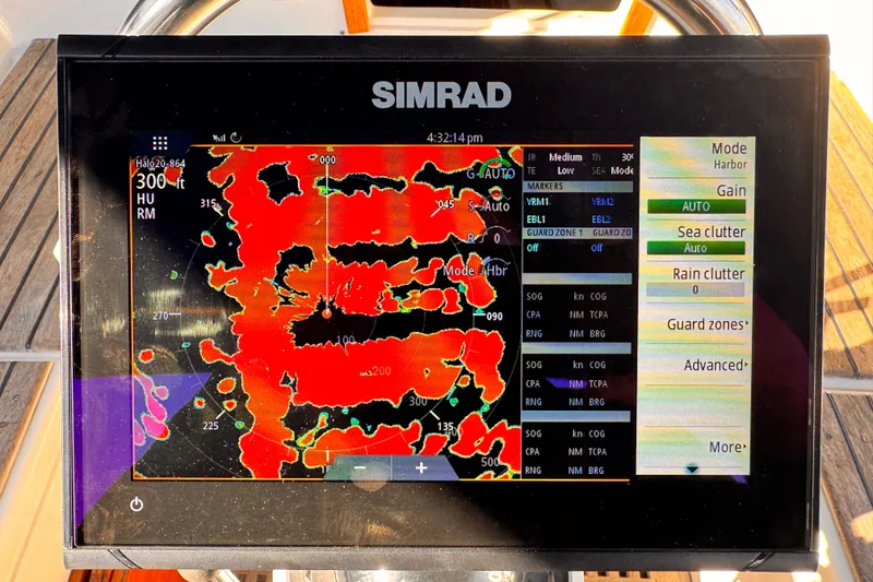 Simrad marine radar display on 1979 O'Day 37 Center Cockpit sailboat, showing navigation data.