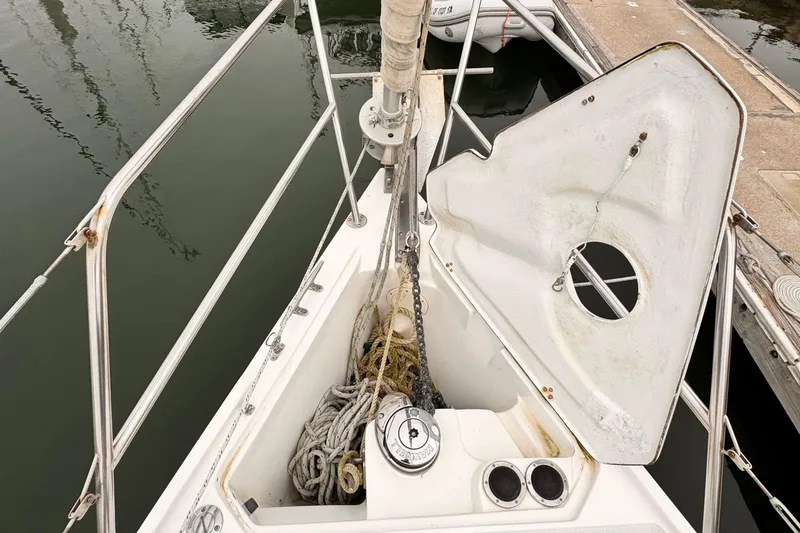 Bow of 2001 Catalina 36 MkII sailboat with anchor and ropes.
