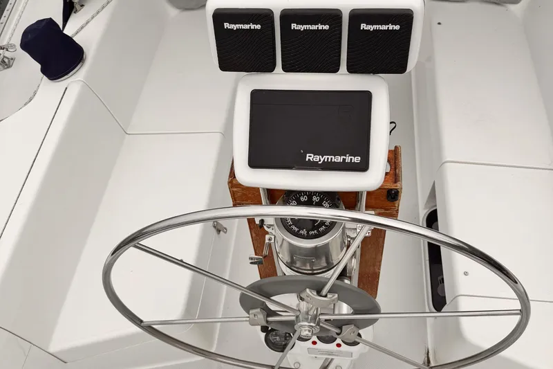 Steering wheel and Raymarine navigation system on 2001 Catalina 36 MkII sailboat.