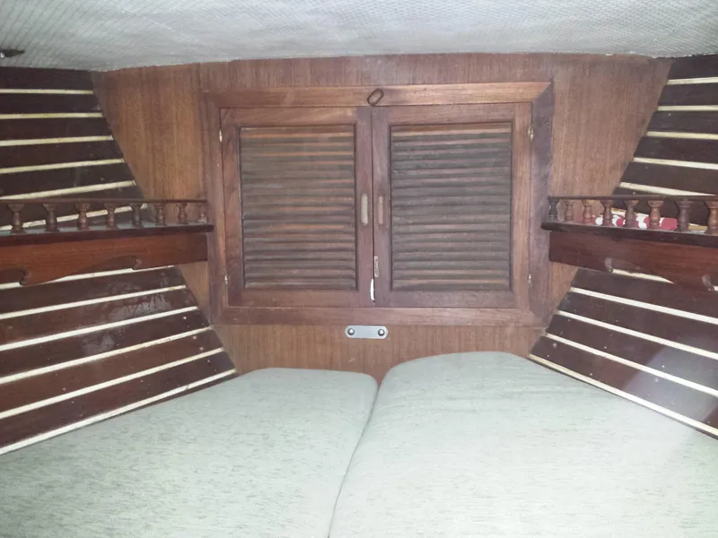 V-Berth, with teak chain locker doors