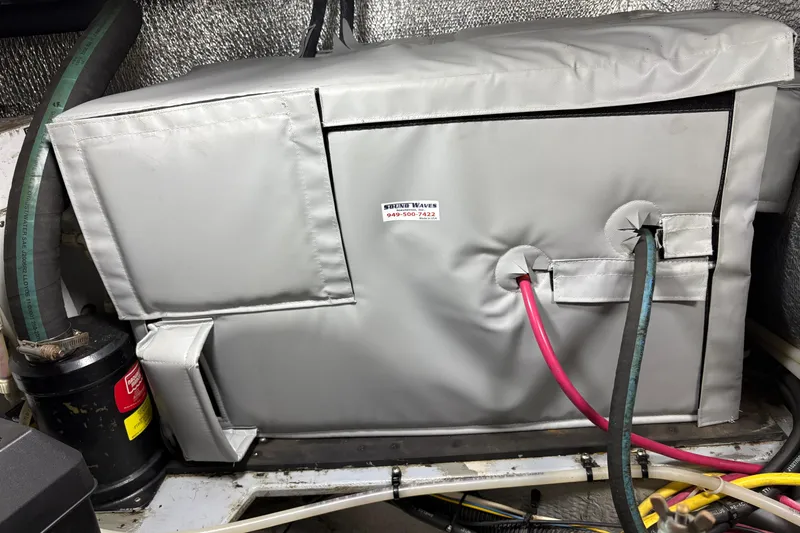 Insulated engine compartment on a 2000 Silverton 42 Convertible boat.