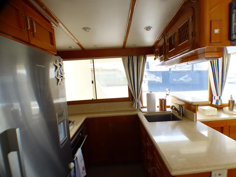 Luxurious kitchen interior of 1987 MedYacht Mallorca 50 with modern amenities.