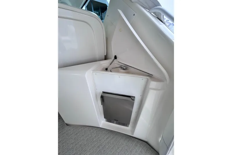 2006 Tiara Yachts 4300 Sovran interior detail with built-in storage compartment.