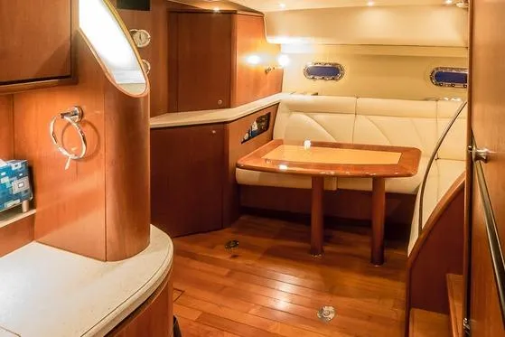 Luxurious 2007 Tiara Yachts 4300 Sovran interior with elegant wood and leather finishes.