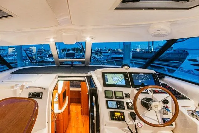 2007 Tiara Yachts 4300 Sovran helm with advanced navigation systems and luxurious interior view.