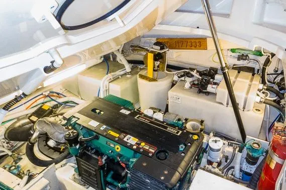 Engine room of 2007 Tiara Yachts 4300 Sovran, showcasing mechanical components and systems.