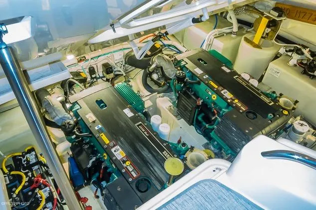 Engine room of a 2007 Tiara Yachts 4300 Sovran, showcasing dual engines and mechanical components.