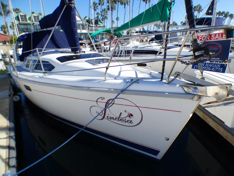1998 Hunter 34 sailboat docked in marina, for sale.