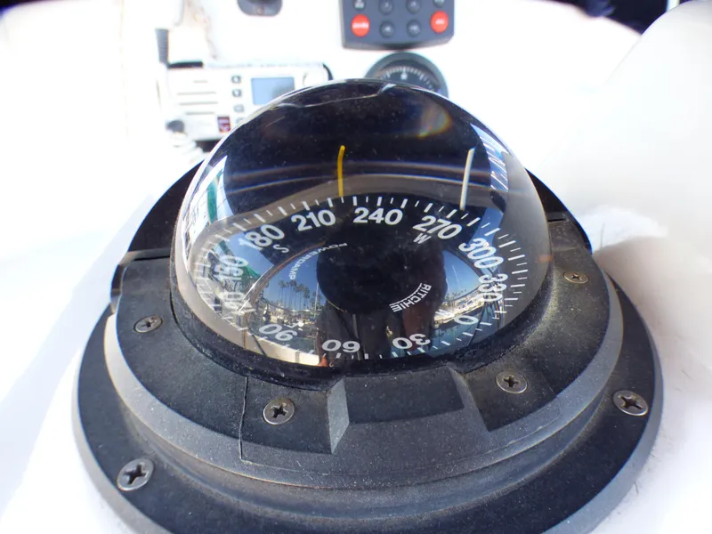 Compass on a 1998 Hunter 34 boat, close-up view.