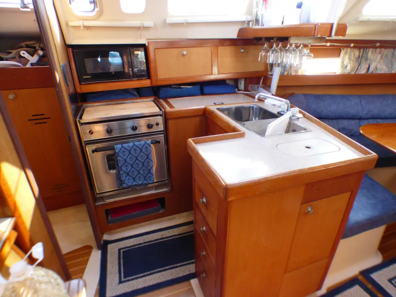 Interior of a 1998 Hunter 34 yacht with kitchen.