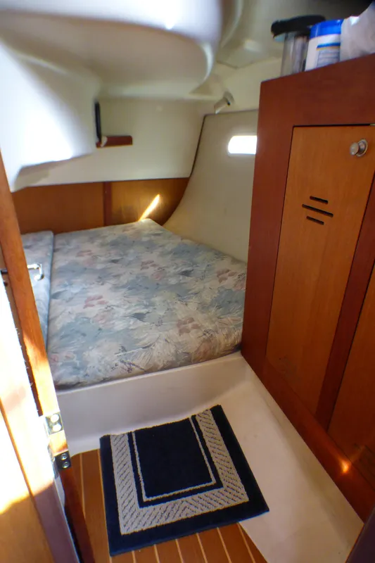 Interior of a 1998 Hunter 34 yacht with cozy cabin.