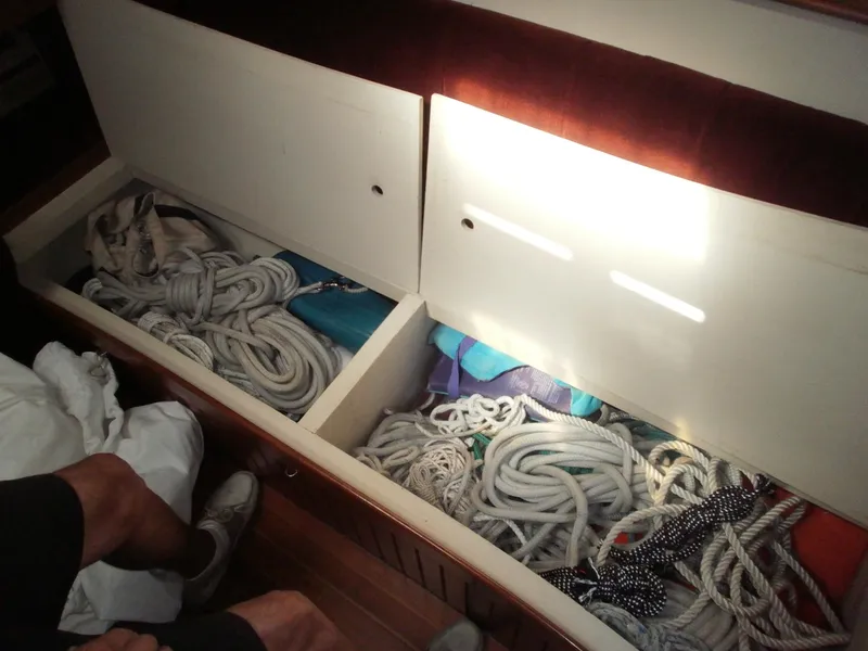 Storage under stb. settee