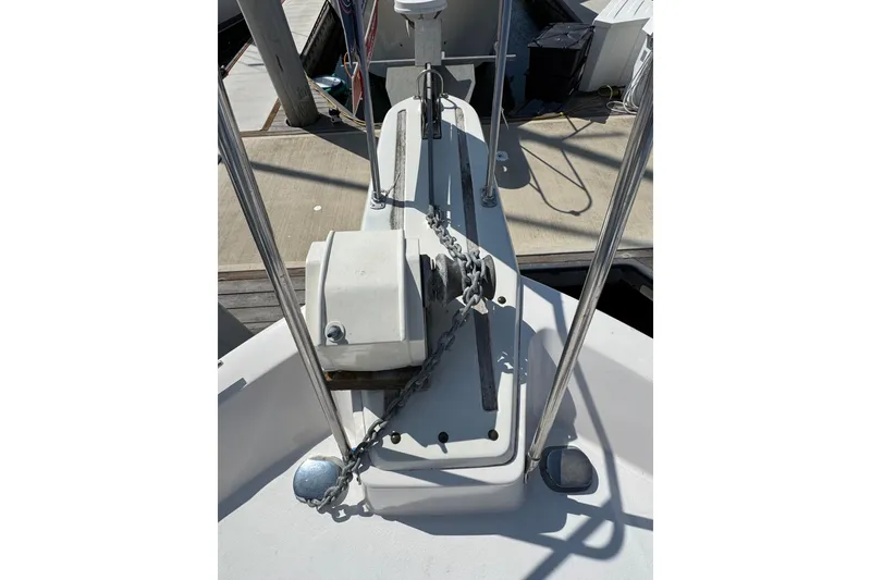 1985 Carver 3607 Aft Cabin Motor Yacht anchor chain and winch on deck.