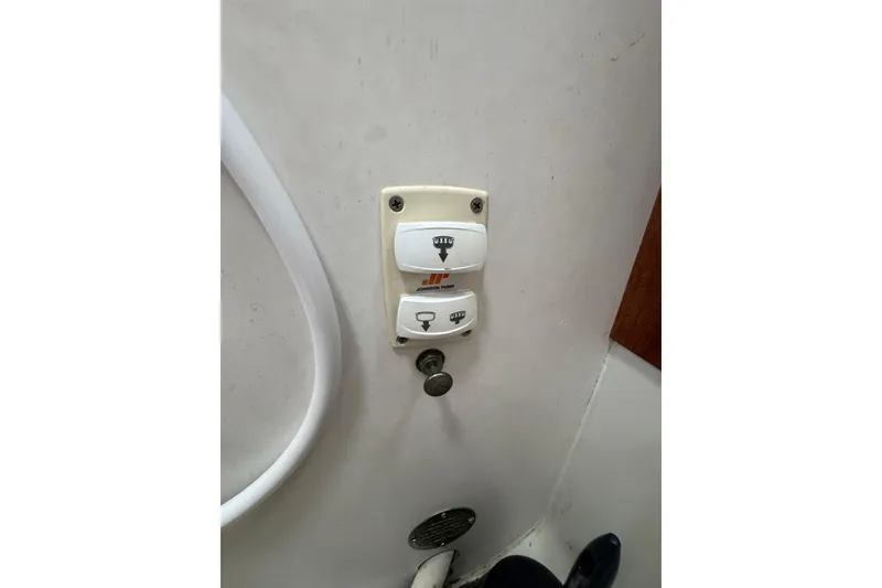 Control panel on 1985 Carver 3607 Aft Cabin Motor Yacht interior wall.