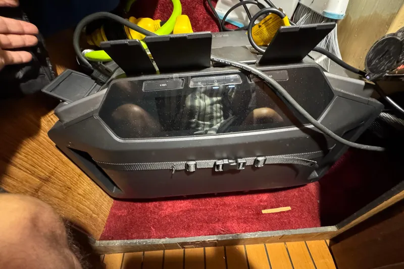 1985 Carver 3607 Aft Cabin Motor Yacht interior with electronic equipment and cables.