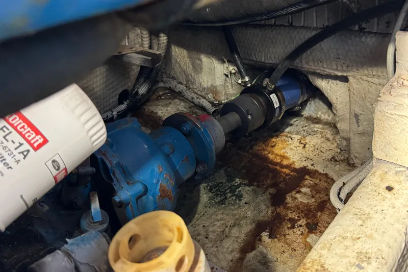 Engine compartment of 1985 Carver 3607 Aft Cabin Motor Yacht showing mechanical components.
