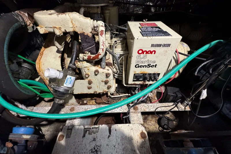 Engine room of 1985 Carver 3607 Aft Cabin Motor Yacht with Onan 6.5 Marine GenSet.
