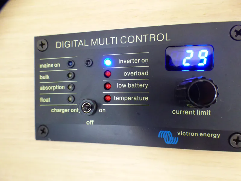 Digital multi control panel on Lagoon 380, 2015 model, showing inverter status and current limit.