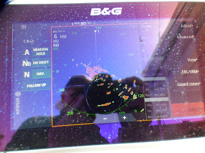 B&G navigation display on Lagoon 380, 2015 model, showing radar and navigation data.