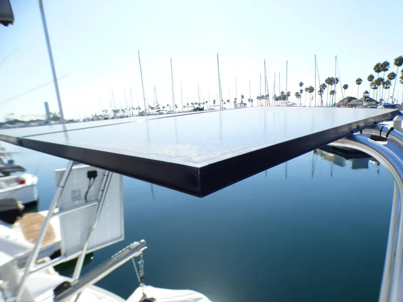 Solar panel on Lagoon 380 catamaran, 2015 model, docked in a marina.