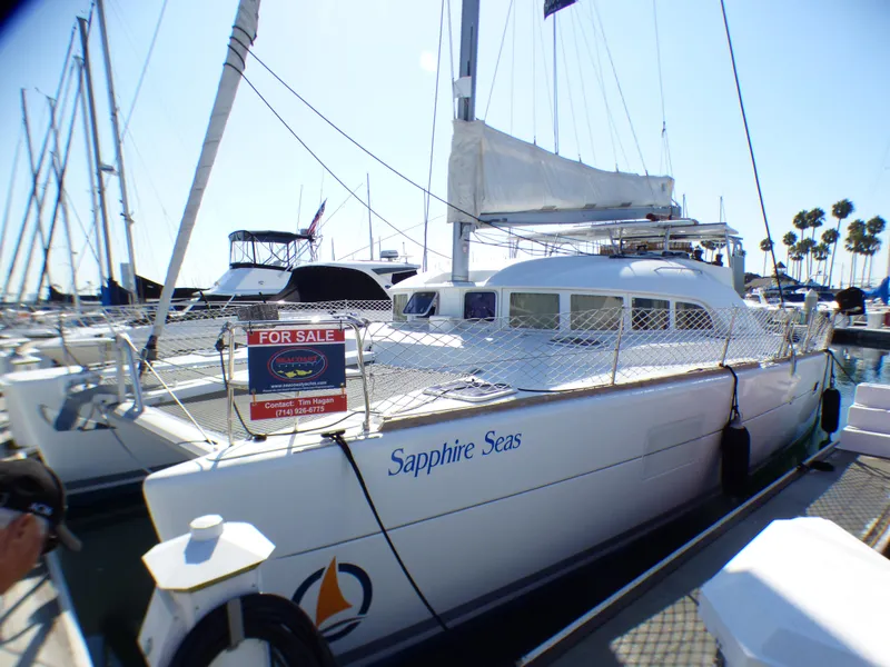 2015 Lagoon 380 catamaran "Sapphire Seas" for sale at marina dock.