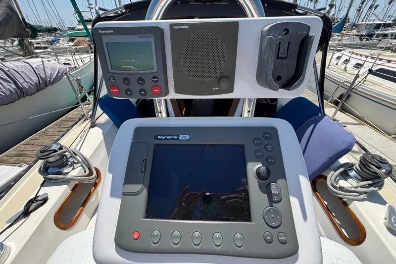 Cockpit of 1987 Catalina 34 sailboat with Raymarine navigation equipment.