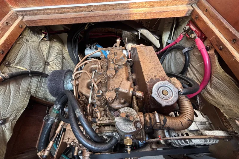 1987 Catalina 34 engine compartment with visible components and wiring.
