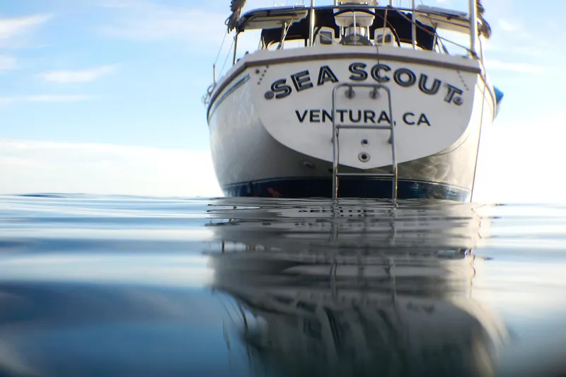 Catalina 34 sailboat "Sea Scout" on calm water, Ventura, CA, 1987 model.