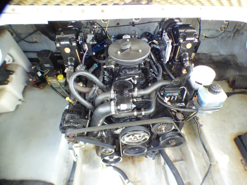 Engine of 2003 Sea Ray 260 Sundancer boat, showcasing mechanical components and layout.