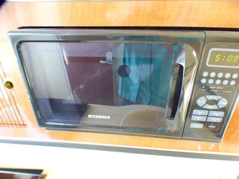 Sylvania microwave in 2003 Sea Ray 260 Sundancer boat interior.