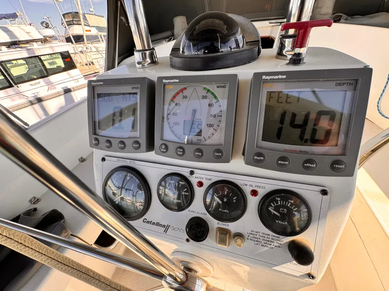 Control panel of a 2004 Catalina 350 sailboat with navigation instruments.