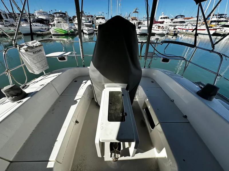 Cockpit of a 2004 Catalina 350 sailboat docked in a marina.