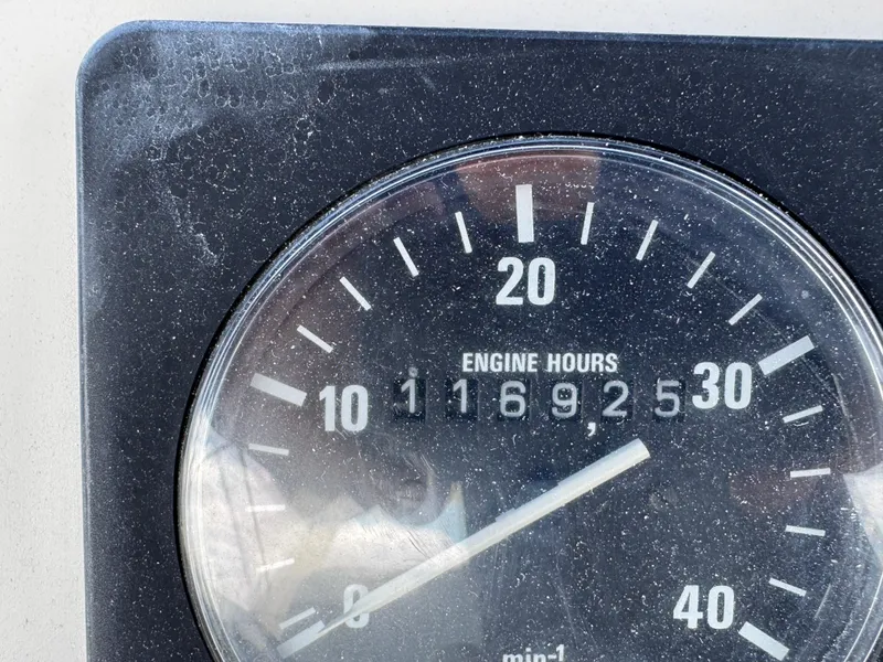 Engine hour meter showing 11,692.5 hours on 1999 McKinna 47 Sedan.