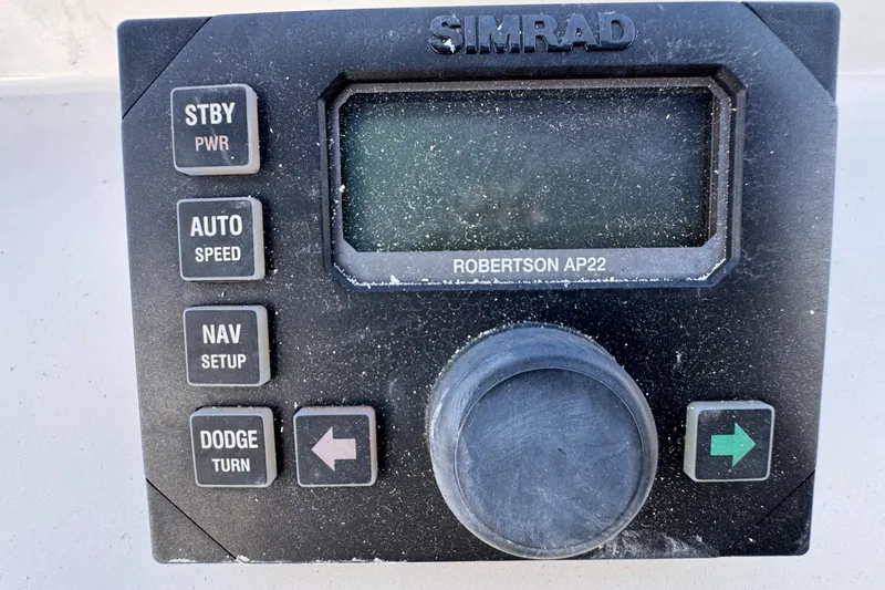 Simrad Robertson AP22 autopilot control panel on a 1999 McKinna 47 Sedan yacht.