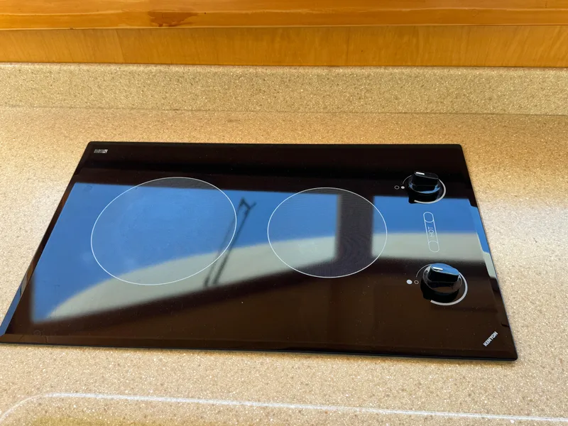 Built-in electric cooktop on McKinna 47 Sedan yacht, 1999 model.
