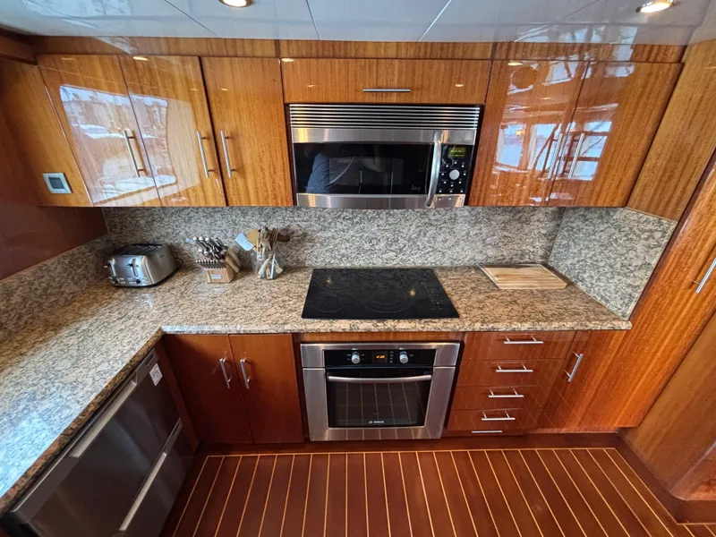 Luxurious Norseman 80 yacht kitchen with granite countertops and modern appliances, 2010 model.