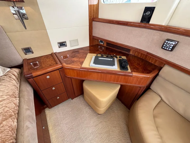 Luxurious Norseman 80 yacht interior with elegant wood finish and comfortable seating, 2010 model.