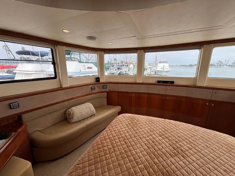 Luxurious interior of 2010 Norseman 80 yacht with marina view.