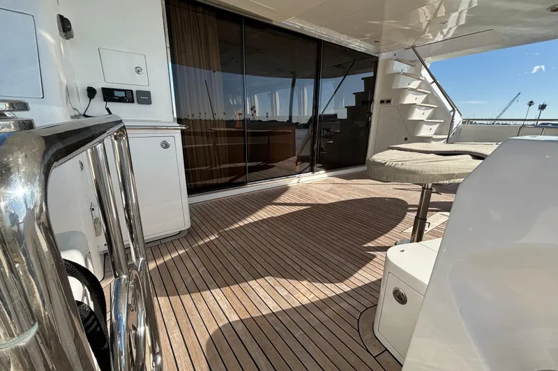 Luxurious Norseman 80 yacht deck with wooden flooring and modern amenities, 2010 model.