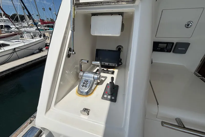Control panel of a 2010 Norseman 80 yacht, featuring navigation and communication equipment.