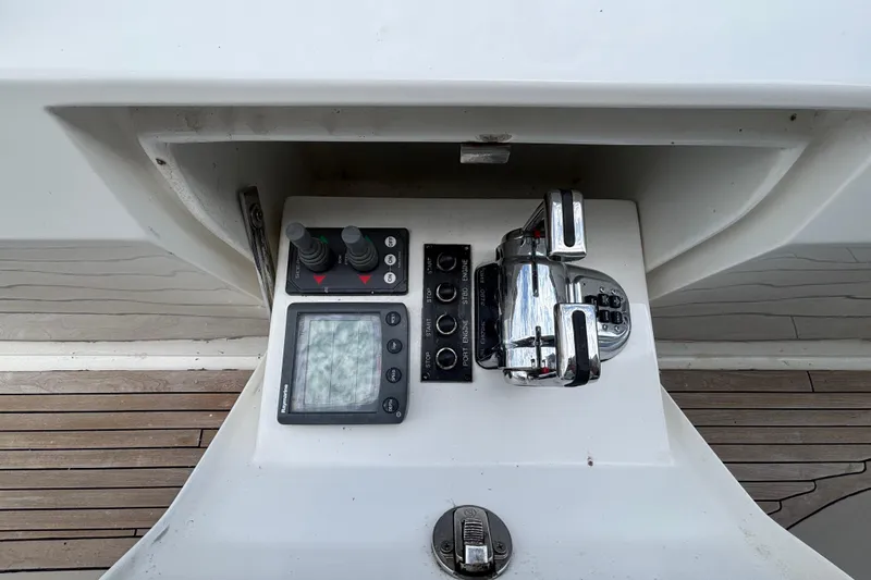 Control panel of a 2010 Norseman 80 yacht with navigation and throttle controls.