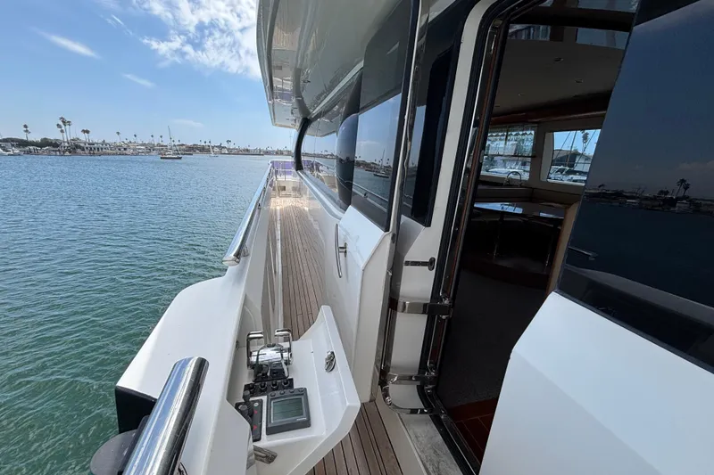 2010 Norseman 80 yacht deck with ocean view and open cabin door.