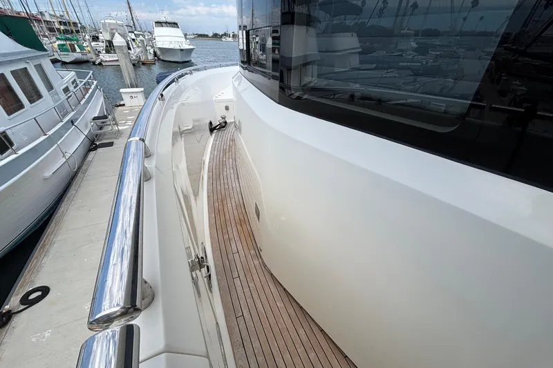 Side deck view of 2010 Norseman 80 yacht docked at marina.