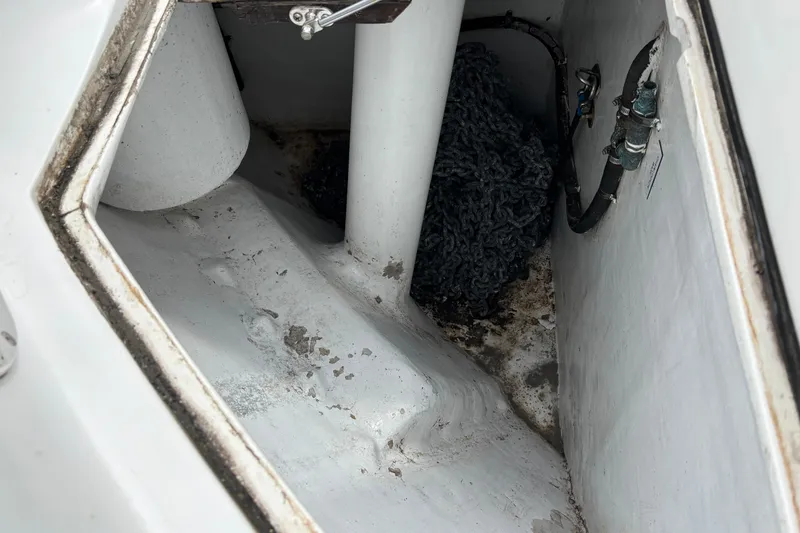 Anchor chain compartment of 2010 Norseman 80 yacht, showing chain and fittings.