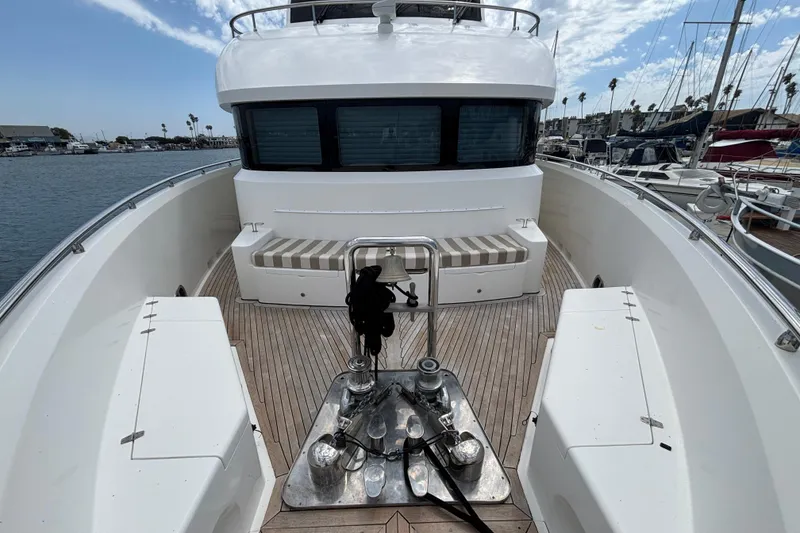 Luxury Norseman 80 yacht deck with seating, docked in marina, 2010 model.
